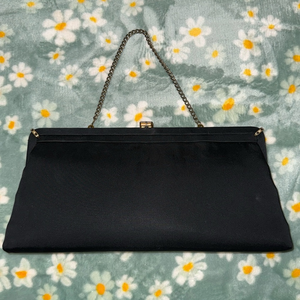 Vintage clutch purse in color black